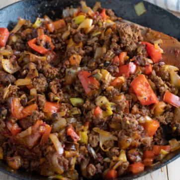 Ground beef and cabbage in a skillet
