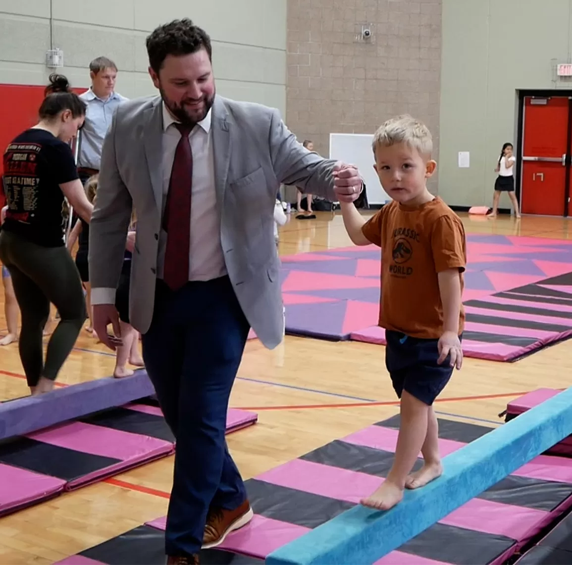 father and son doing gymnastics