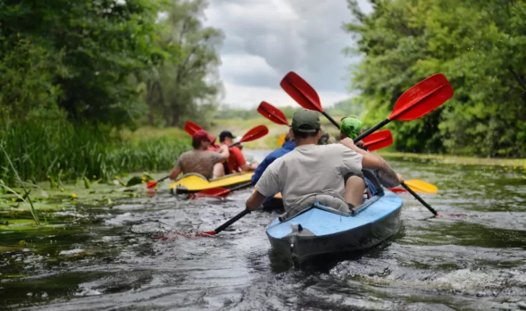 group of people canoeing