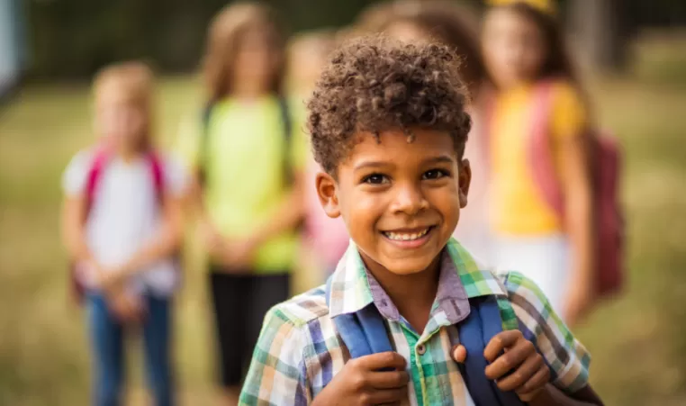 Happy child with a backpack