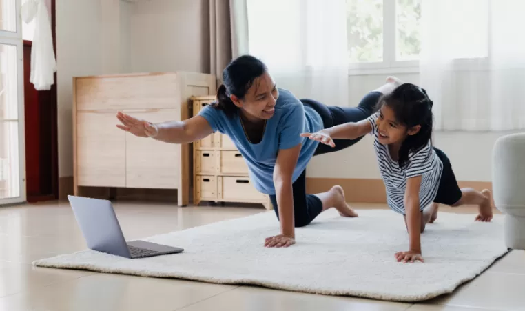 mother and daughter exercising