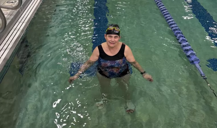 Woman smiling in a pool