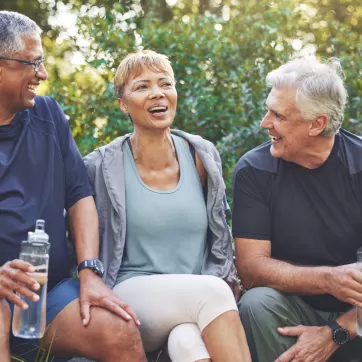 3 friends talking and drinking water