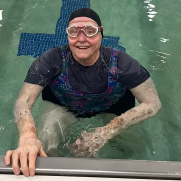 Woman smiling in pool