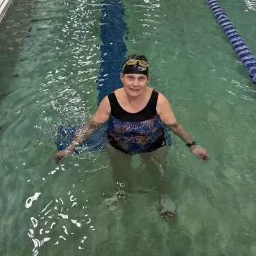 Woman smiling in a pool